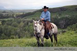 S tímto cowboyem jsme jezdili na jeho koních po okolní hezké přírodě